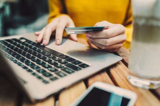 A woman making an online payment with a credit card