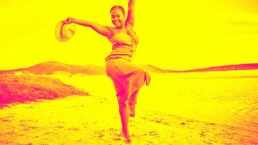 Portrait of an ecstatic young woman enjoying her time at the beach depicting Social Commerce Latin America