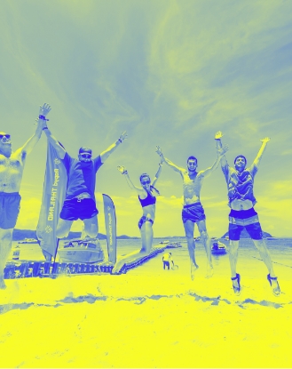 Image of a Group of Happy Rapyd Employees at Beach Event